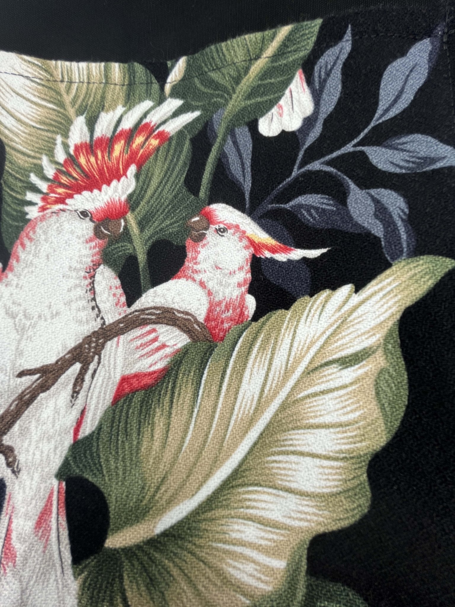 Close up image of fabric for Lori April’s Love Birds Hawaiian Barkcloth Tote Bag with luxurious hawaiian barkcloth